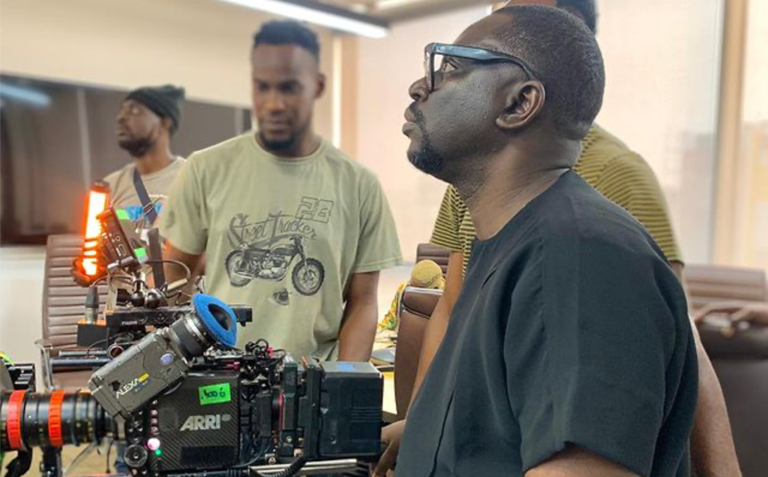 'The Man For The Job' Niyi Akinmolayan On Set