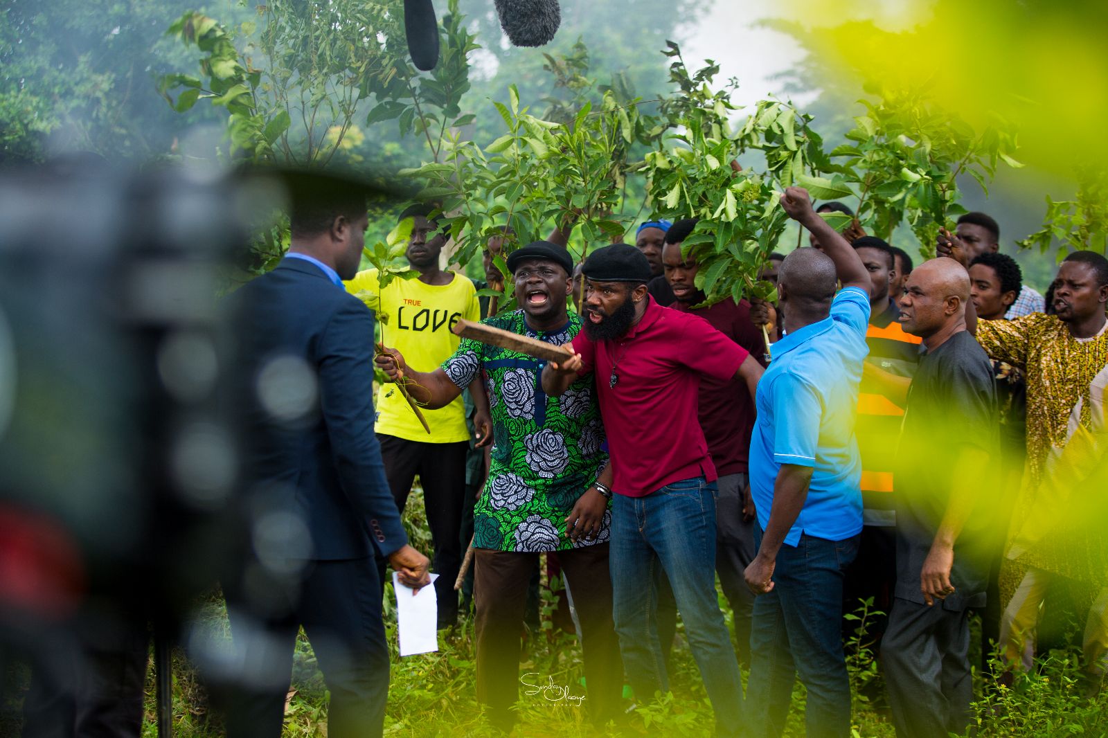 'Wura' Season 3: Showmax Returns with Explosive Series Finale on 23 September 2024 2 Lanre Adediwura among crowd on the set of 'Wura' Showmax - Nollywire