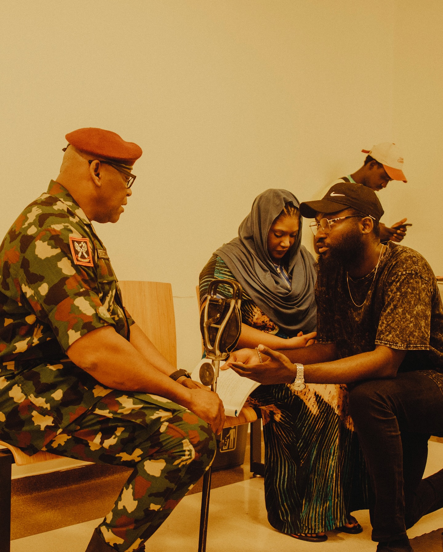 'At Ease:' Seun Richards' Journey from Military Aspirations to Mental Health Awareness in Nollywood 2 Seun Richards with Keppy Epkenyong on the set of 'At Ease' © First Features Project