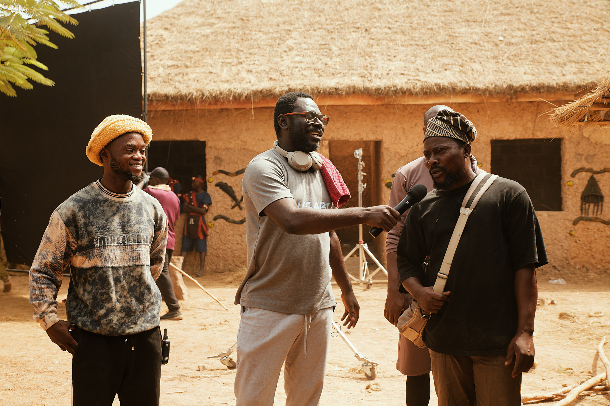 Niyi Akinmolayan’s Plans to Reshape Nollywood’s Workforce in 2025 1 Niyi Akinmolayan with set design crew members on the set of 'Lisabi.' © Nollywire 2023