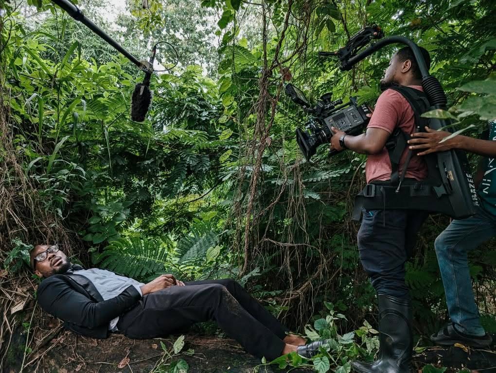 Emmanuel Igbekele shooting Daniel Etim Effiong on the set of 'The Herd'