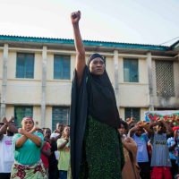 Ufuoma McDermott on the set of 'The Uprising Wives on Stike 3' - Nollywire